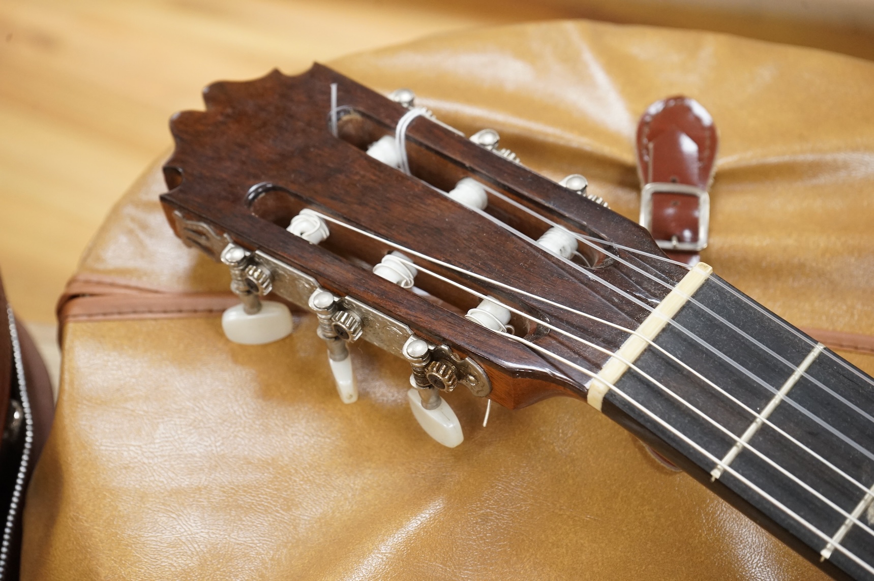 A Spanish Manuel Contreras classical guitar, with cedar front, Indian rosewood back sides and ebony fingerboard, with makers label inside body; M.G. Contreras, Madrid, back 49cm